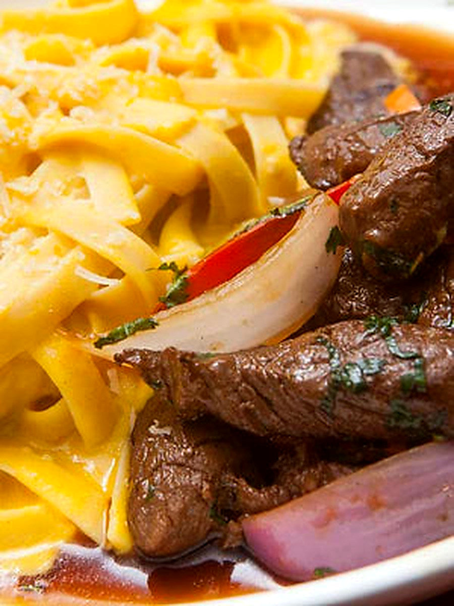 Fettuccine con Lomo Saltado - Encuentro Marino